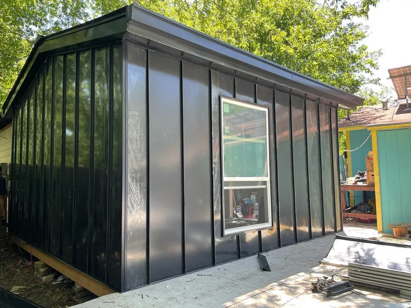 Black standing seam metal wall panels for Roof Inspection in North Canton