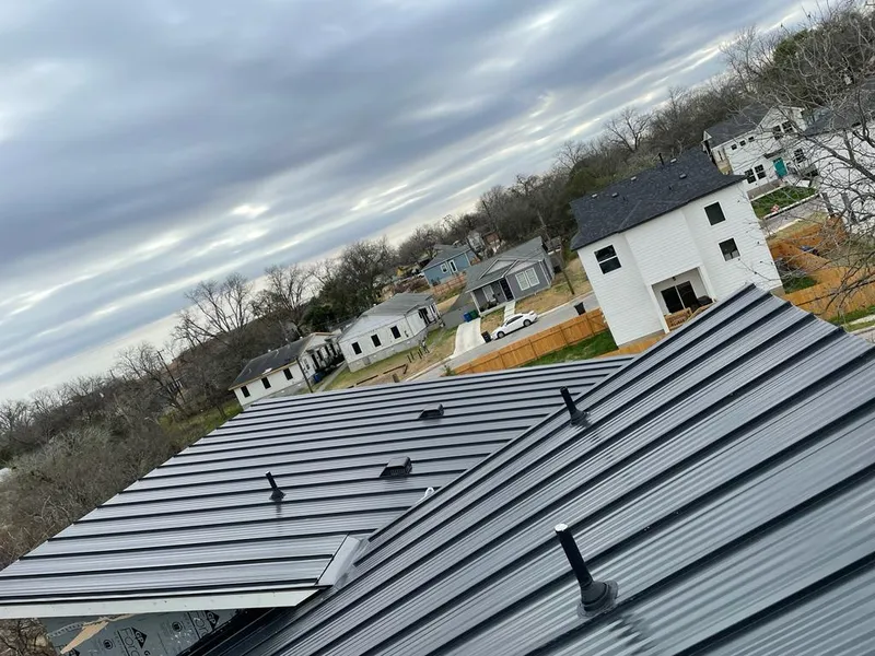 Standing seam metal roof panels with vents for Skylight Repair in North Canton